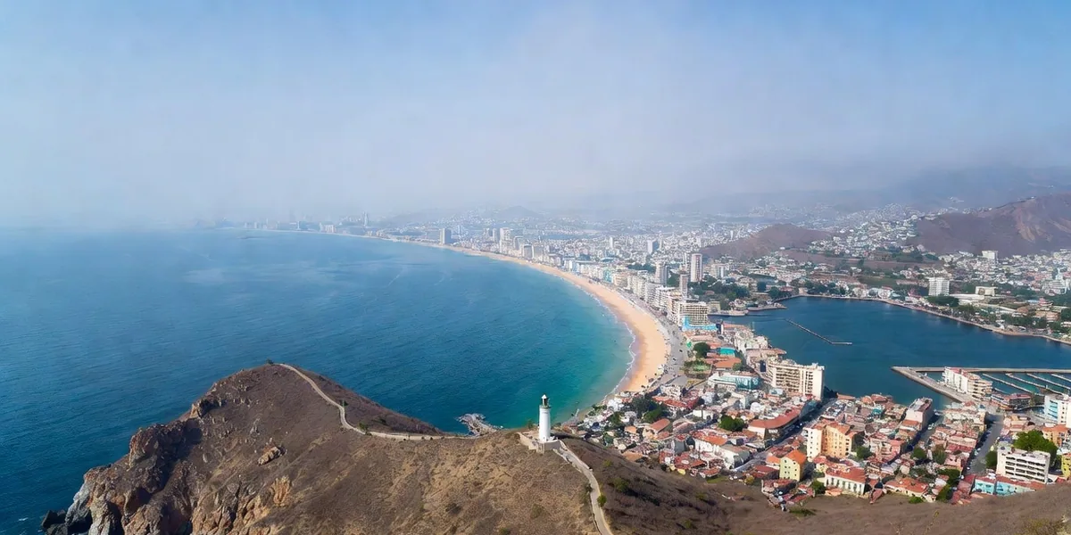 View from El Faro lighthouse hill over Mazatlán's coastline, harbor and old town