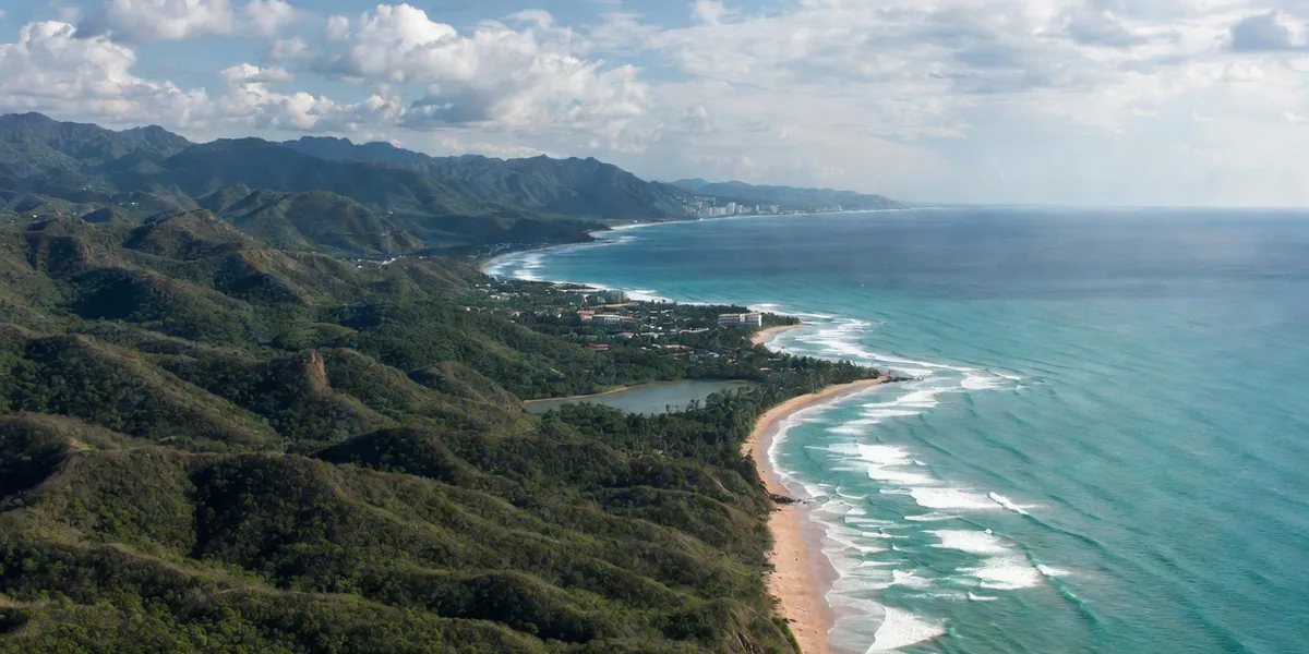 Jungle mountains meeting Pacific surf coves along the Riviera Nayarit coastline